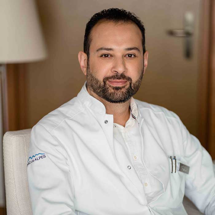 a man in a white coat